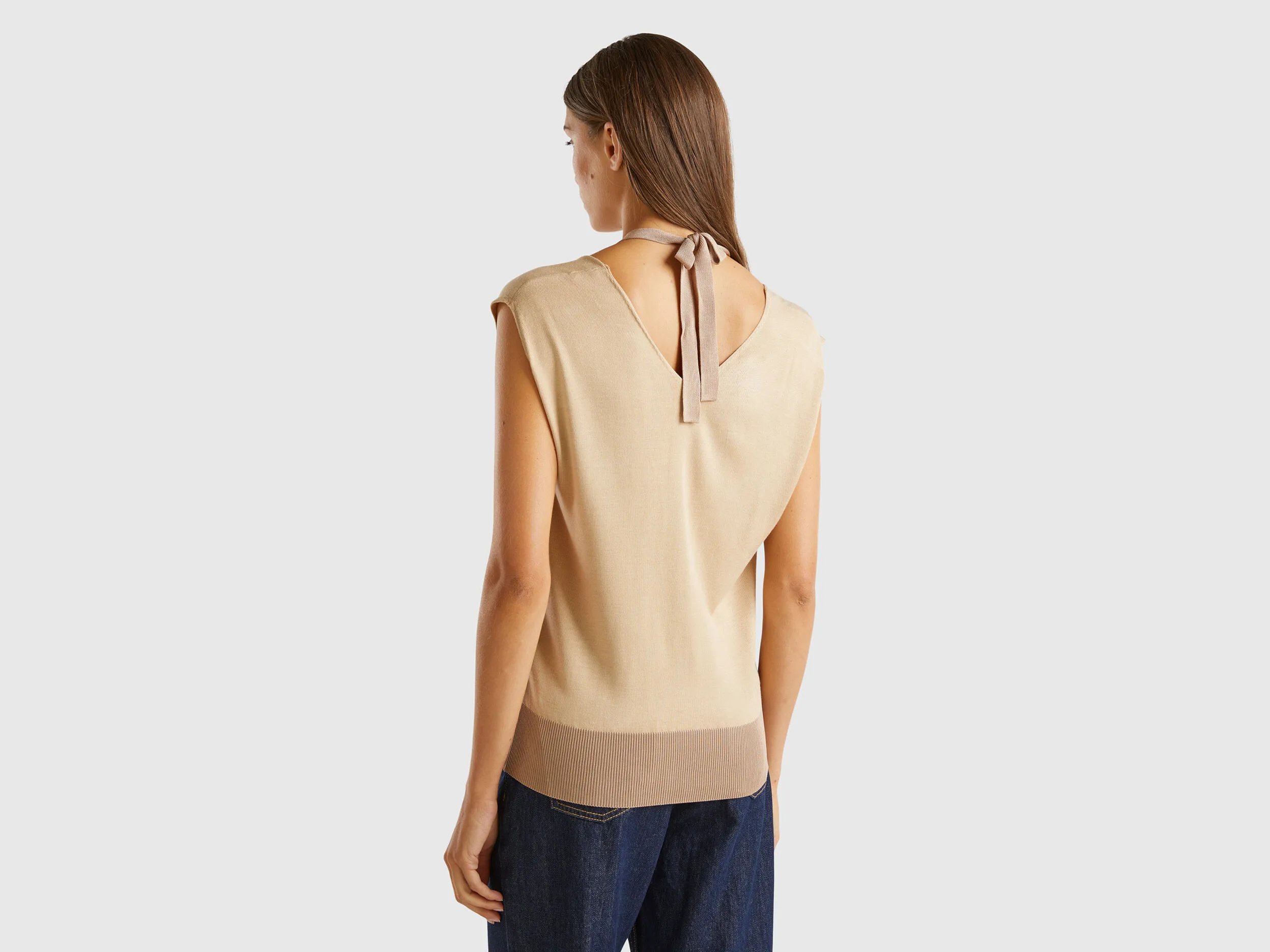 Flowy sweater with V-neck and laces - Beige | Benetton