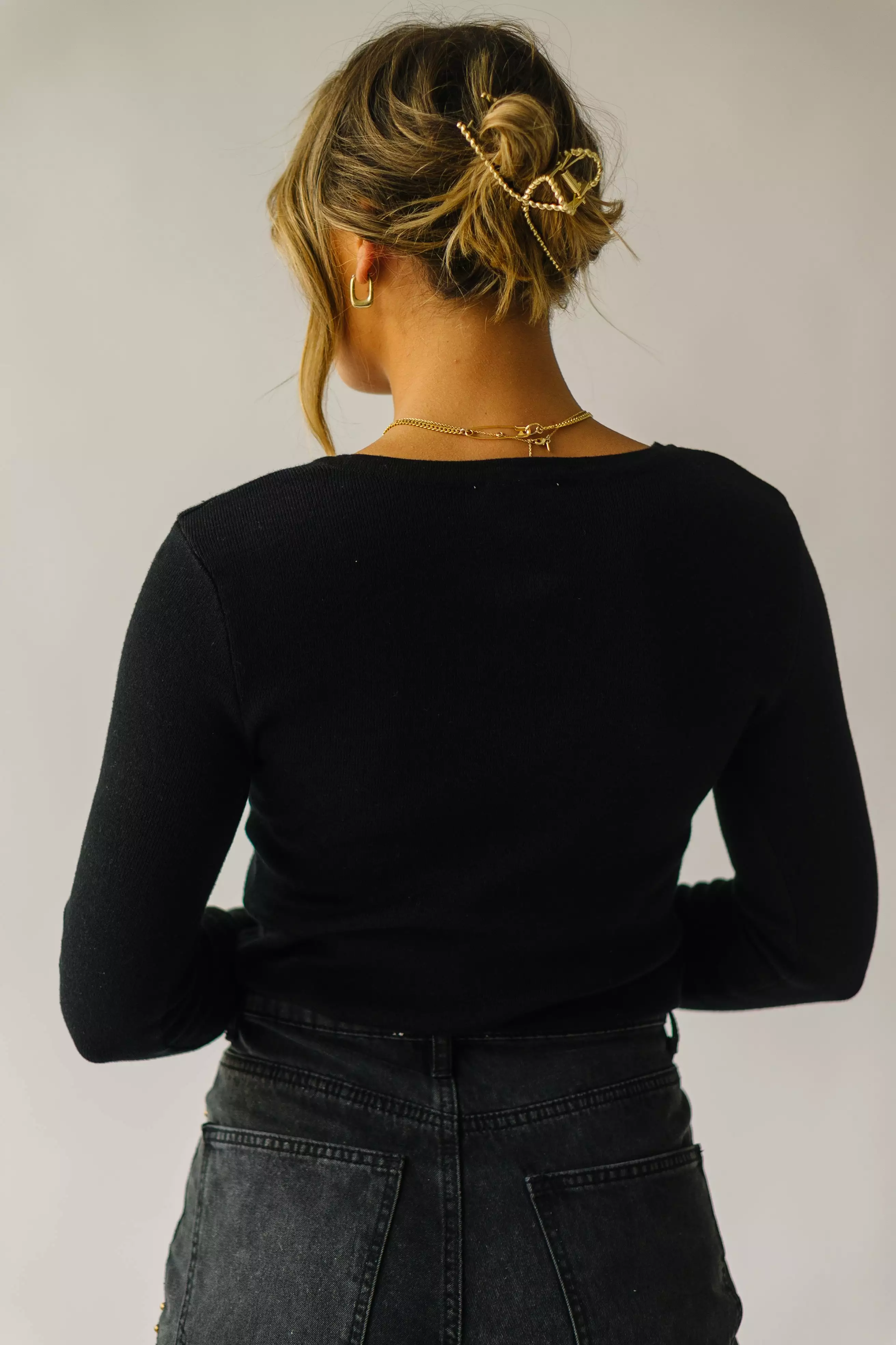 The Brynn Asymmetrical Detail Blouse in Black