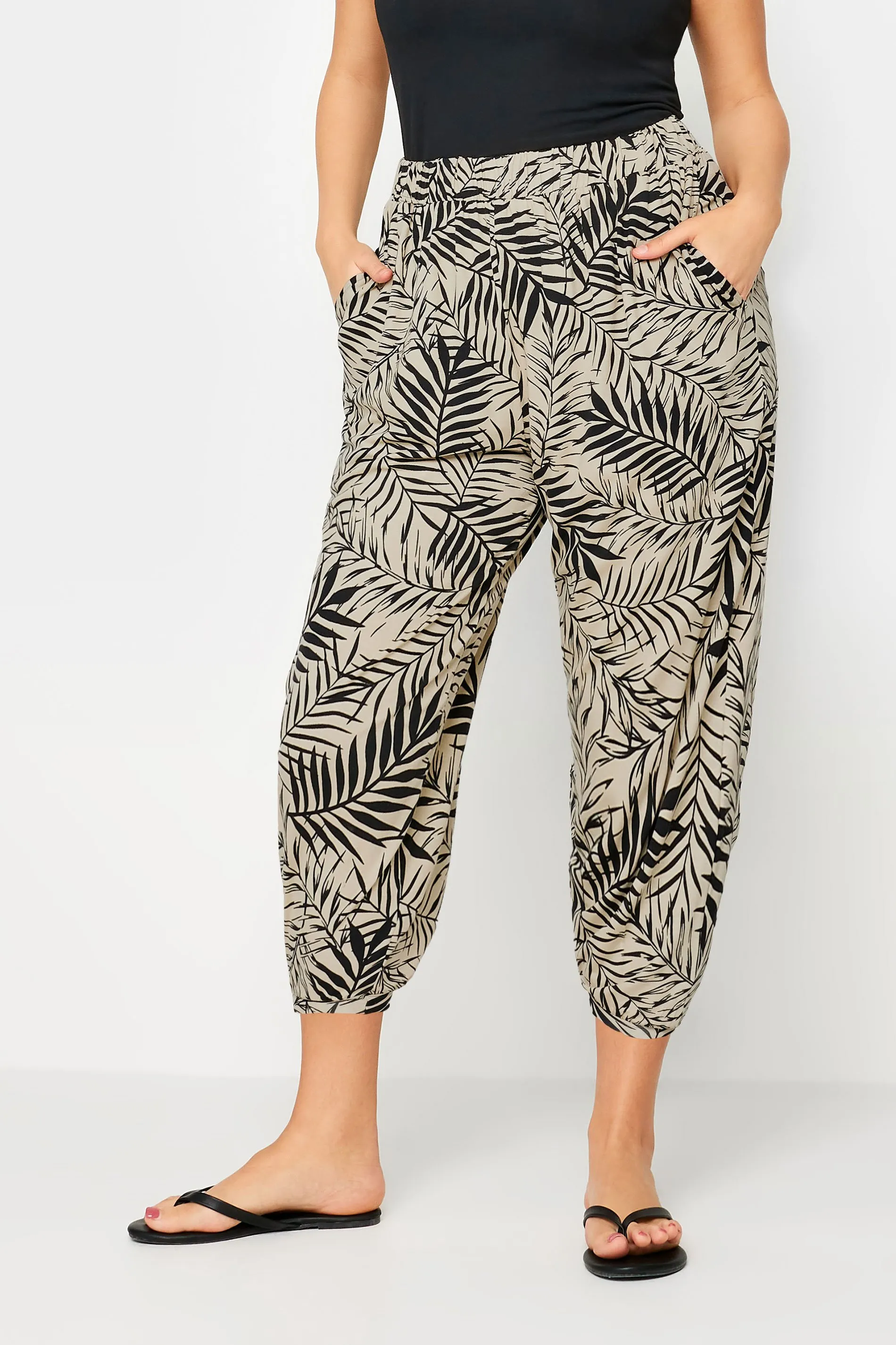 YOURS Curve Beige Brown Leaf Print Cropped Harem Trousers