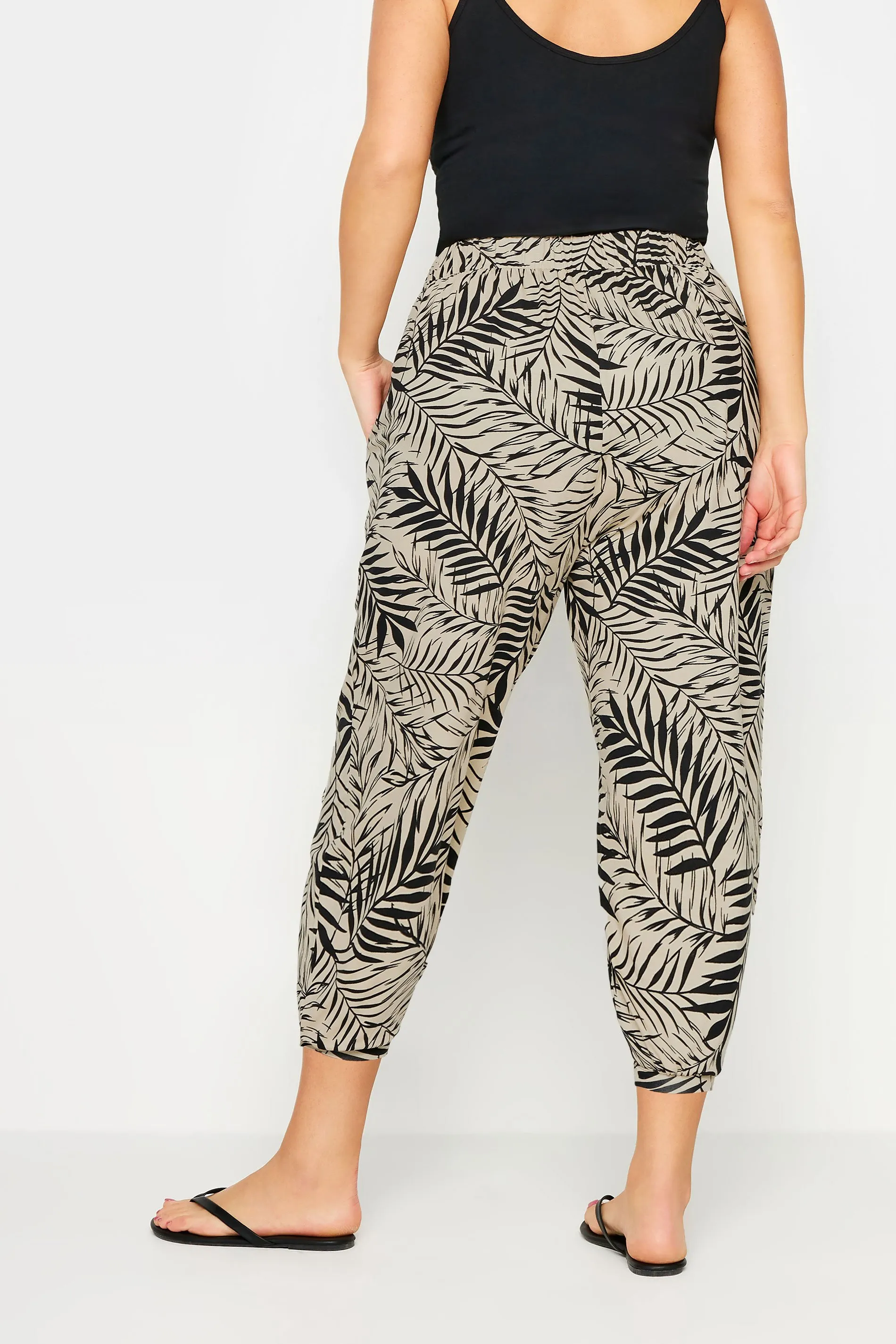 YOURS Curve Beige Brown Leaf Print Cropped Harem Trousers